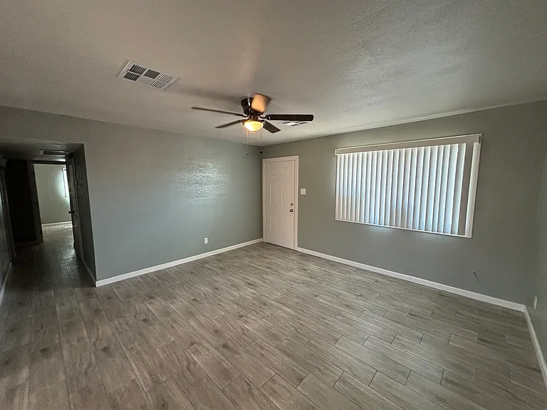 Beautiful plank style tile flooring throughout.