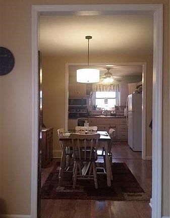 Looking into the eat in kitchen from living room.