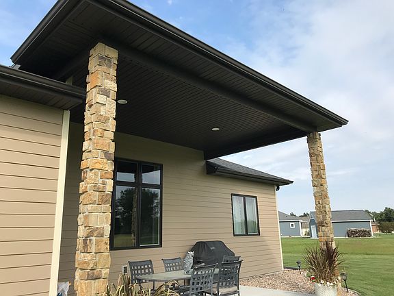 Covered patio faces course 