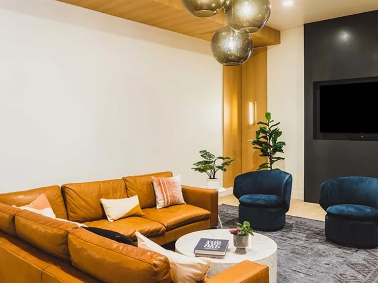 Relax in plush lounge seating at Modera Broadway