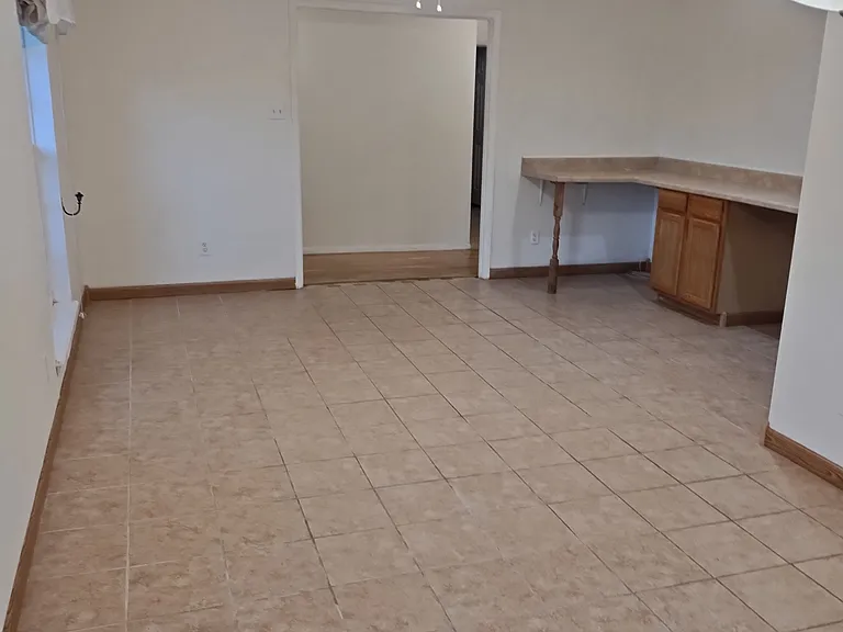 From Dining Room facing back towards Entryway with office space in picture.