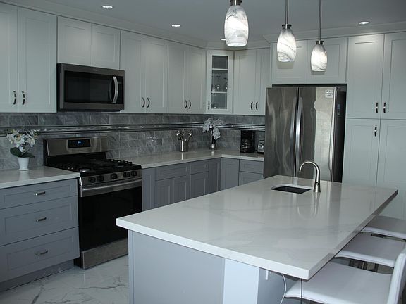 Kitchen, with stainless steel appliances
