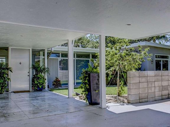 Enter this beautiful home through the port de cochiere