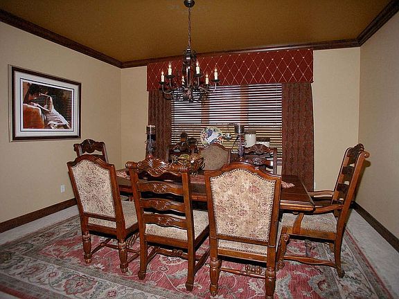 Generous formal dining room accomodates many guests