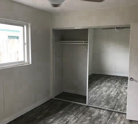 Bedroom, new flooring and fan