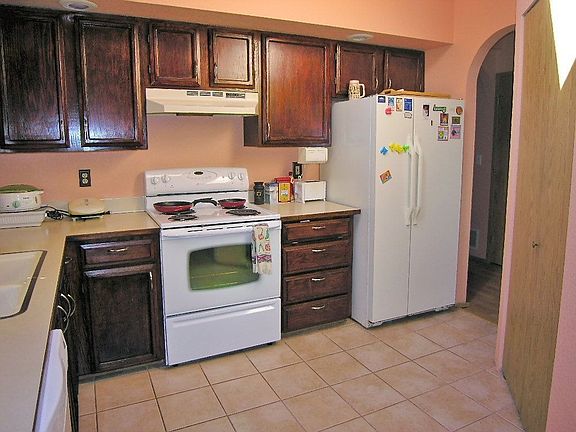 New tile in Kit and baths, pantry and skylight