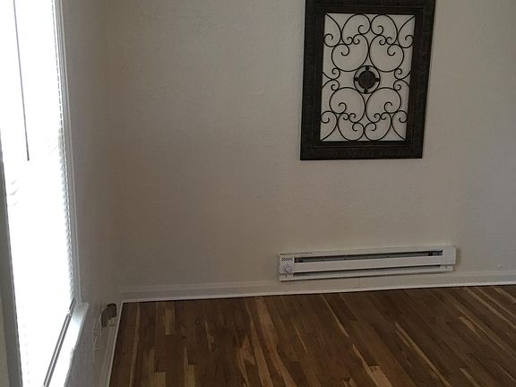 Living room area. Window is south facing. Curved ceilings with thick walls. Keeps you warm in winter, cool in summer.