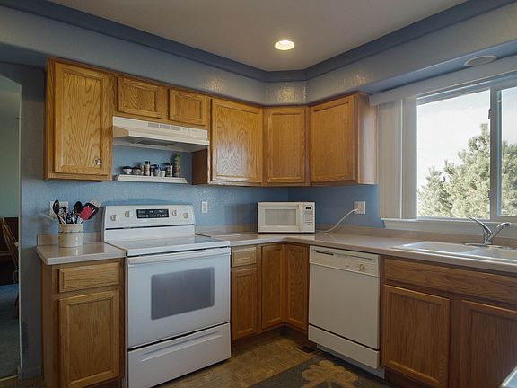 4th image of 20309 E 48th Dr