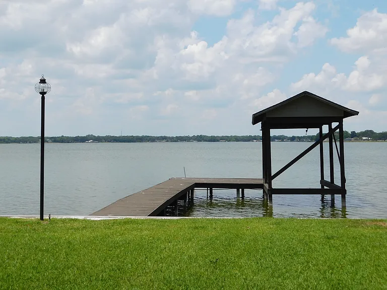 Love to play on/in the water? A boat dock & boat house lets you live the dream!