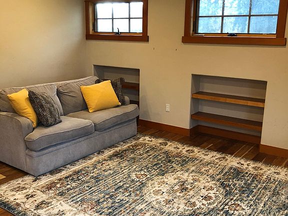 Living room, Couch folds out into a sofa bed. Rug included.