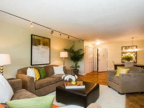 Living room connects to dining area