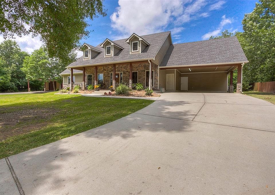 This is the gated driveway entrance leading to the main house on the fully fenced private estate located minutes from all that Historical Downtown Montgomery has to offer.