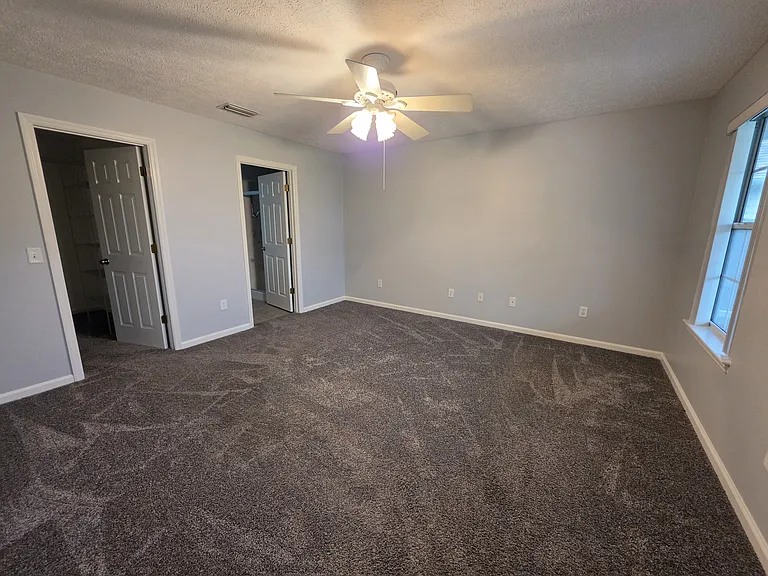 Master bedroom in the back of the home