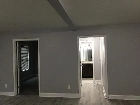 Rooms on walk in level/that's a bathroom
 On the right room on left is a bedroom