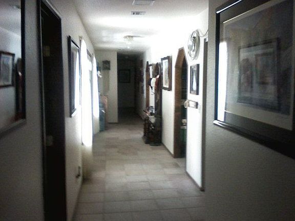 Hallway~sunny area on the left is front door