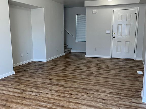 Living room with entertainment alcove