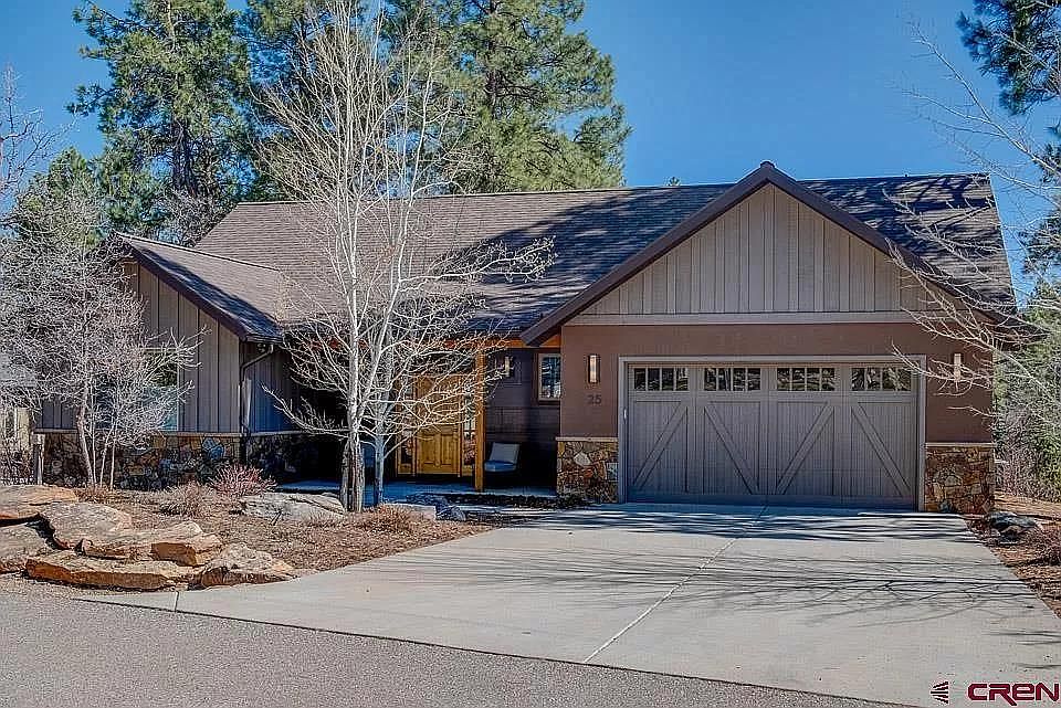 Front drive and 2 car garage