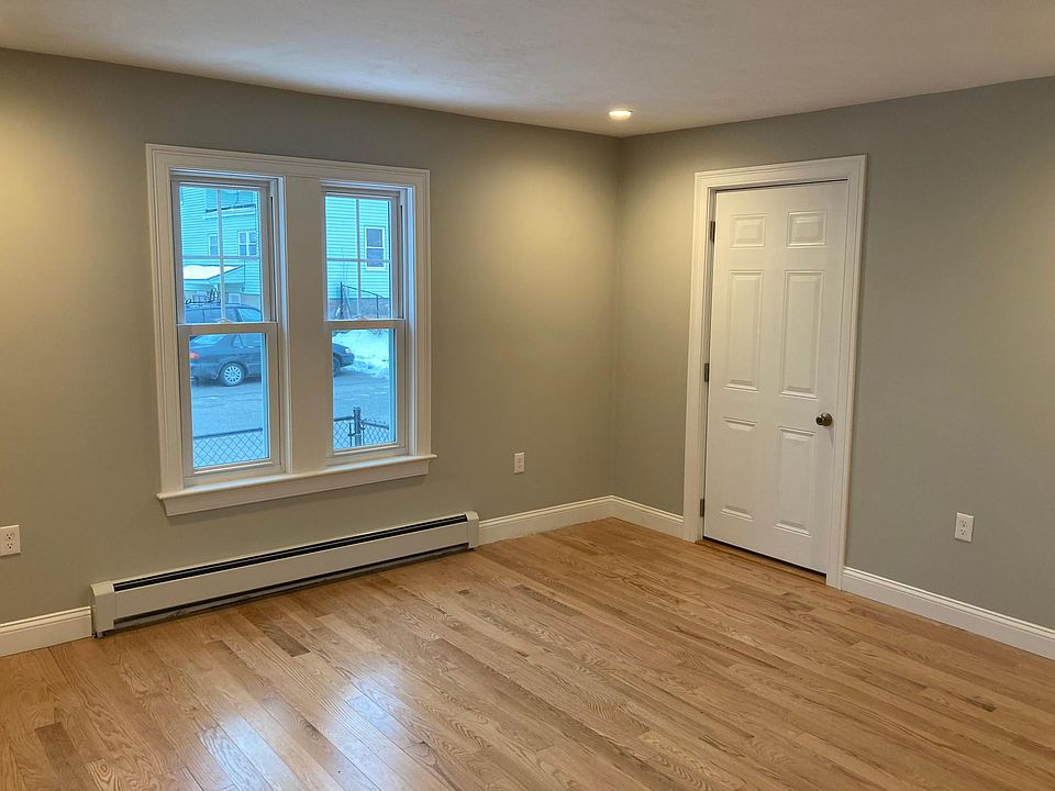 Master bedroom with exterior door to front porch