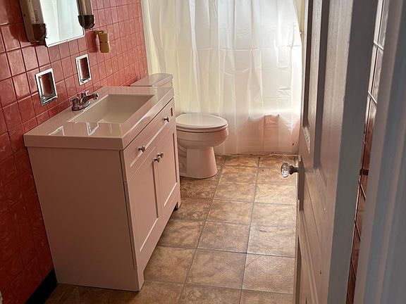 Bathroom with new vanity. New window to be installed in late May