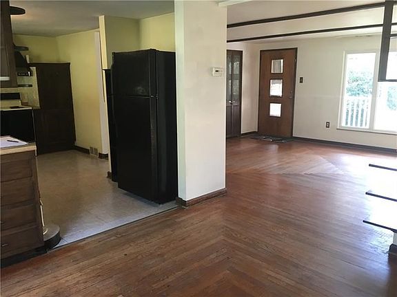 Another view of the Dining Room with open access to the Living Room and Kitchen. This home was built with pretty much an open co