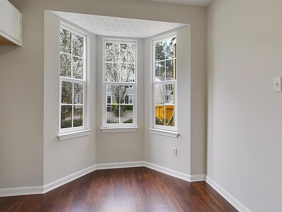 Bay window in kitchen bringing in tons of natural light