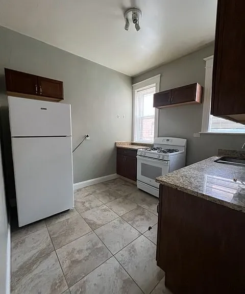 6009 Waterman Blvd — Photo 8