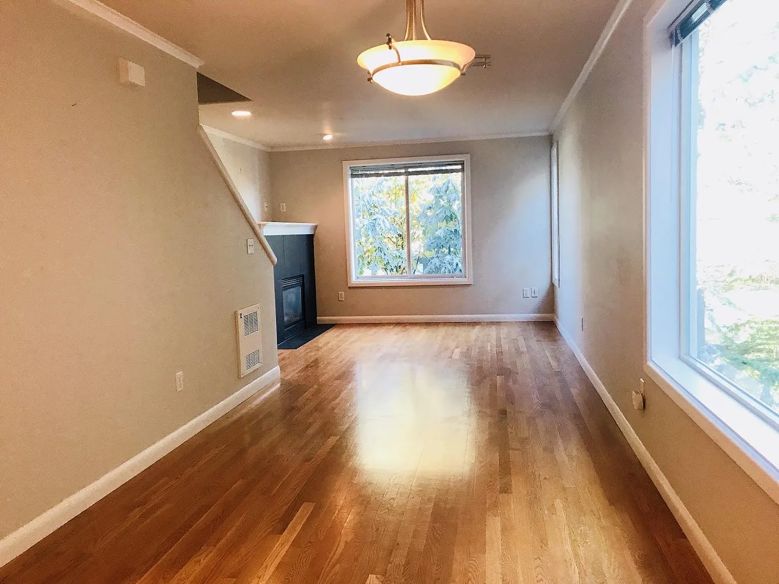 Dining and living space with gas fireplace