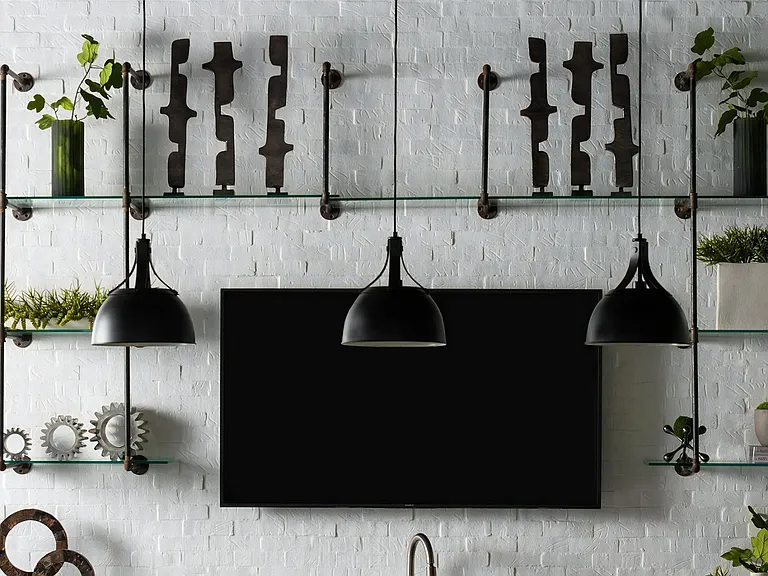 Flat Screen TV on White Brick Wall