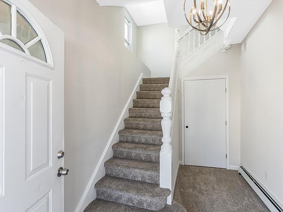 First Floor entrance to unit 2 stairwell. Door to laundry in basement. Washer/dryer pending delivery & will be for the exclusive use of Unit 2 tenants.