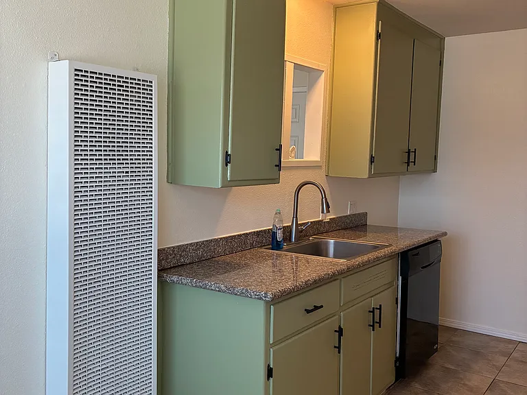 Kitchen includes garbage disposal and Dishwasher. Refrigerator and Electric Stove