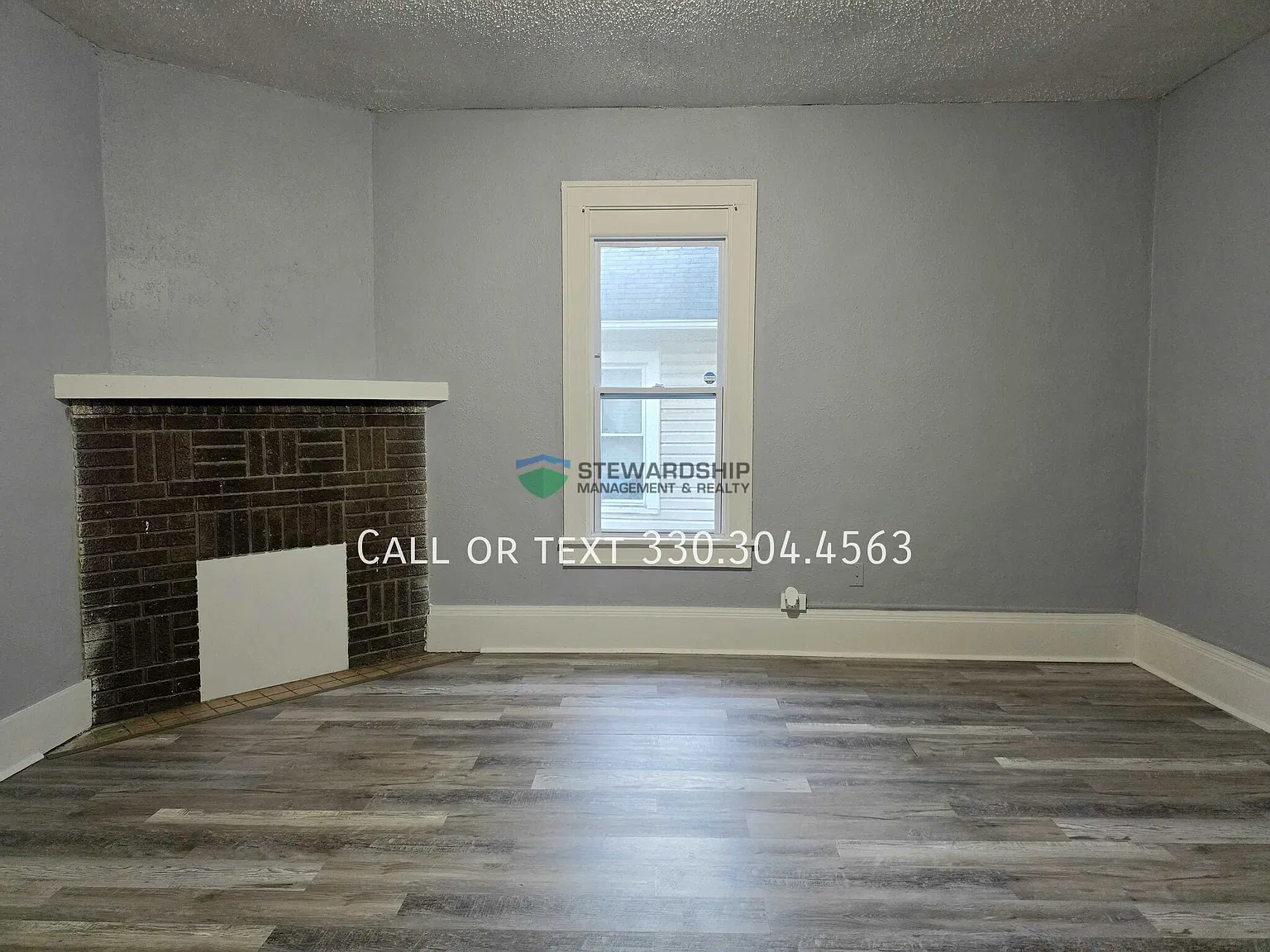 Three-Bedroom, One-Bathroom Duplex In Akron Available Now! — Photo 2