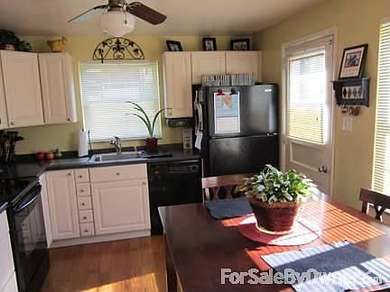 Kitchen
						:
						Updated eat in kitchen with new refrigerator and stove.