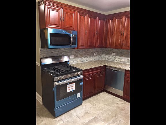5th image of 7703 S South Park Ave