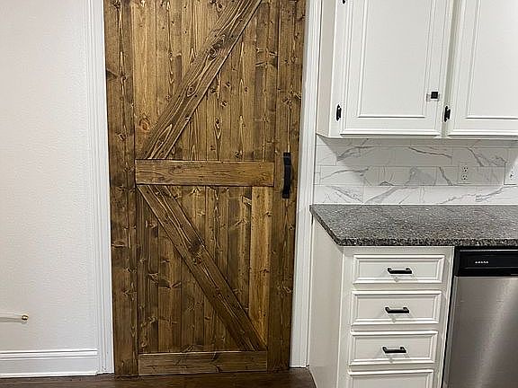 Barn door to laundry room