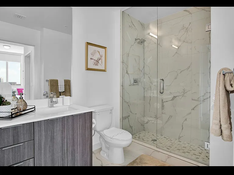 2 Bedroom - Model Unit | Bathroom with Glass Shower Enclosures