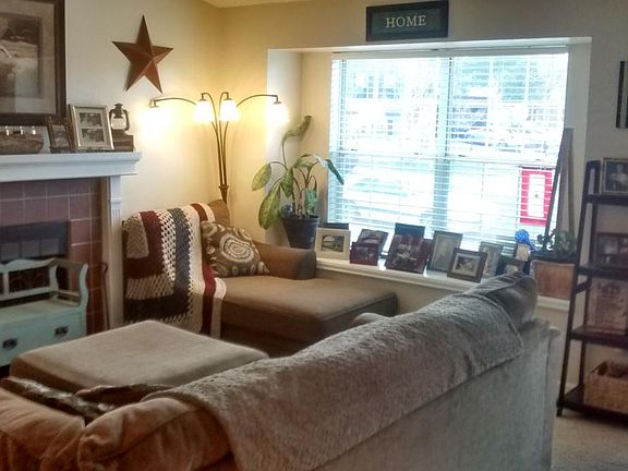 Living room shown decorated (first when you enter home).