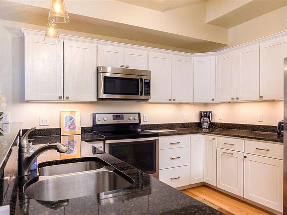 Great kitchen with spacious countertops and full amenities: oven, microwave, dishwasher, refrigerator and freezer. Separate drink water faucet with RO filtration.