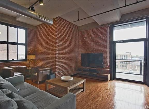 Very open great room with balcony view.