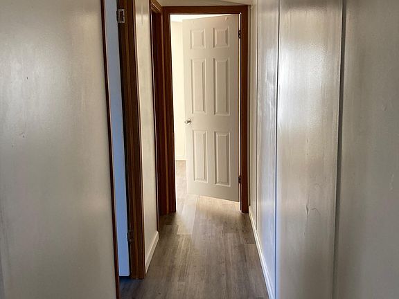 Hallway to 2 bedrooms and guest bathroom