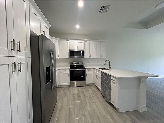 4th image of 11-13 E 12th Street