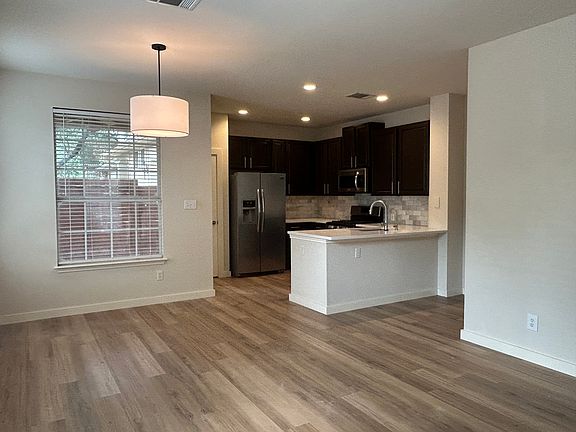 Living room is open to the kitchen and dinning room.