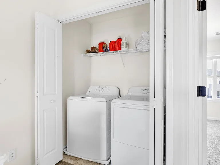 Laundry closet located on the second floor in between the bedrooms!