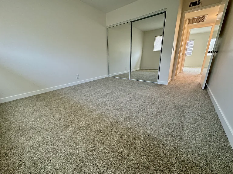 Bedroom number 3 with new mirrored wardrobe doors, carpet & paint!