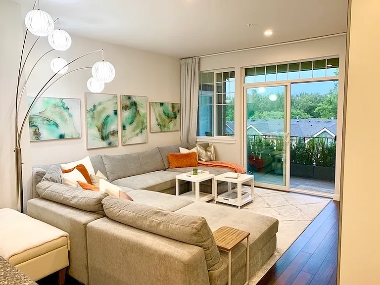 Oversized signature feather-filled sectional exceptionally comfortable and consistently loved by past tenants