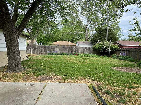 Fenced backyard with a patio!