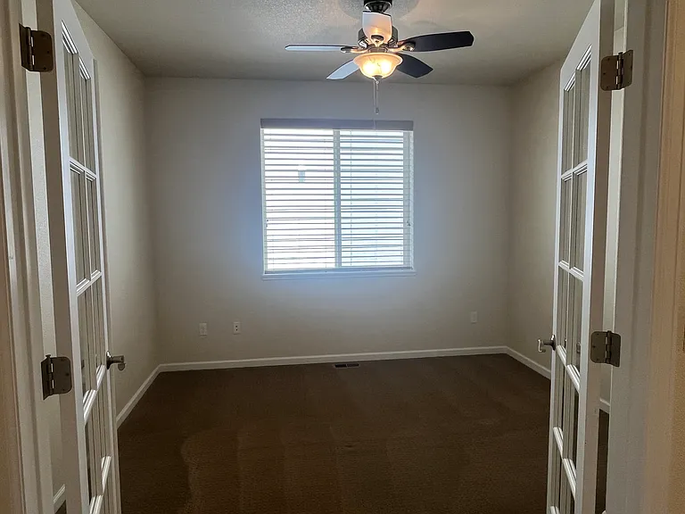 3rd bedroom would be ideal as an office or nursery because of the glass french doors.