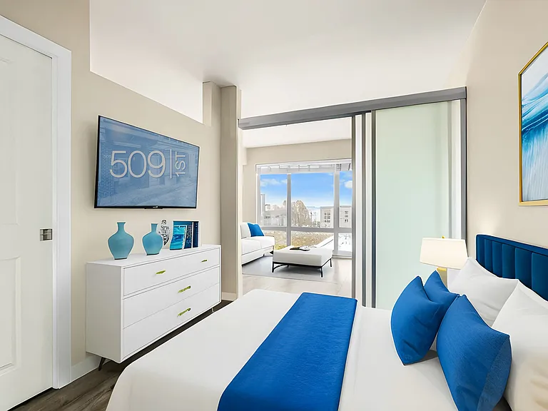 A restful bedroom with bright, airy finishes.