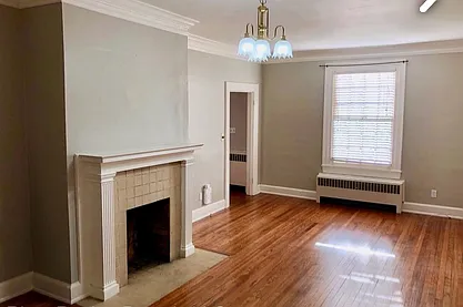 Family room 2 (radiators have just been removed and walls painted white)