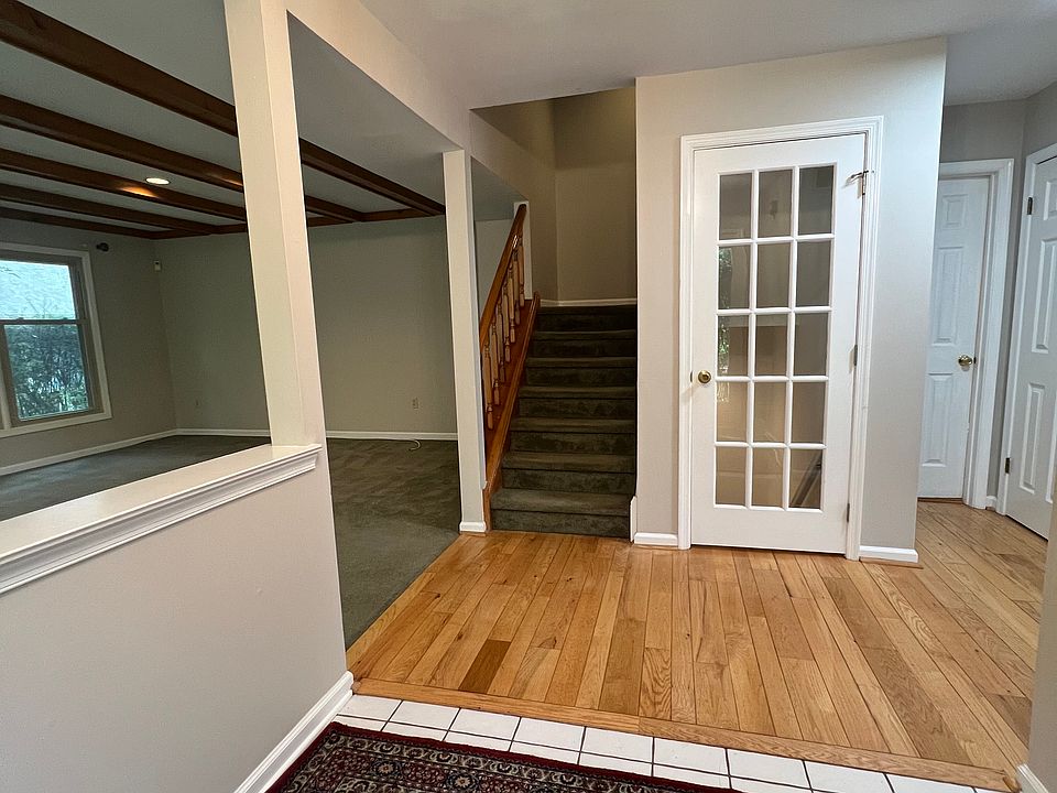 Tile foyer leads to open floor plan.