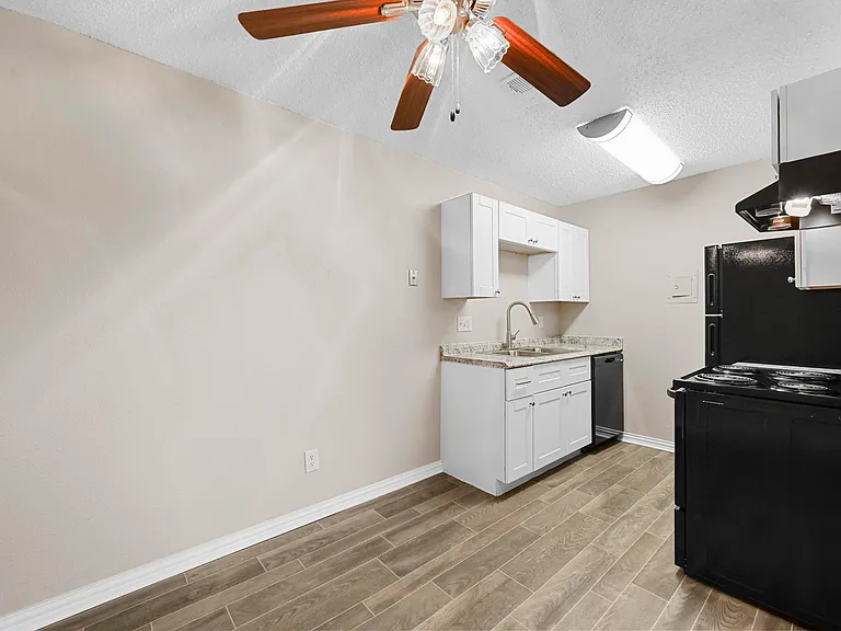 Updated kitchen with black appliances